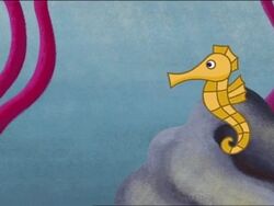 A seahorse in the ocean.