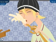 The computer pops the zit (Jonesy's hand).