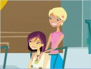 Nikki getting a shoulder rub from Caitlin.