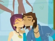 Stone and Nikki kissing.