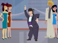 Wayne dances, disco-style.