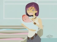 "Look who's holding a baby!"