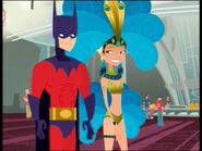 Talon in a superhero costume with Caitlin in a showgirl costume.