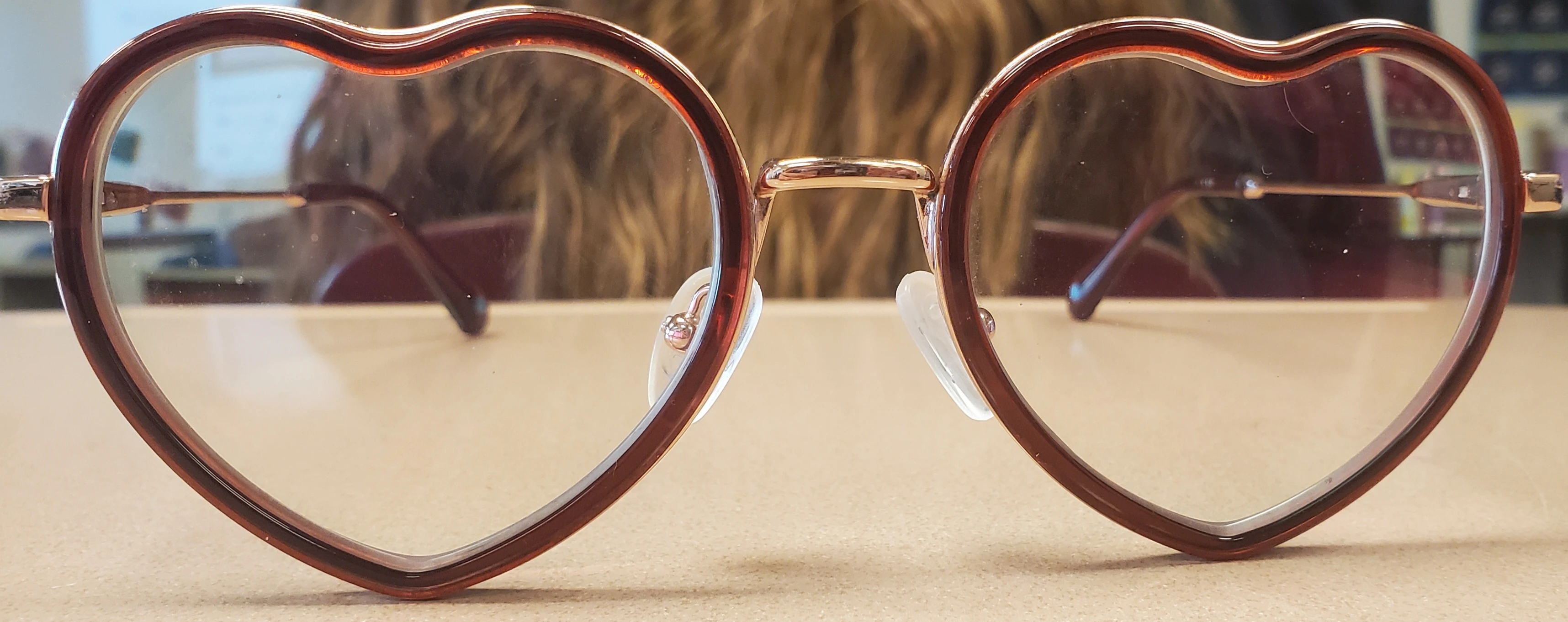 My current glasses. (Thanks, Zenni, for making weird frames!) Tye