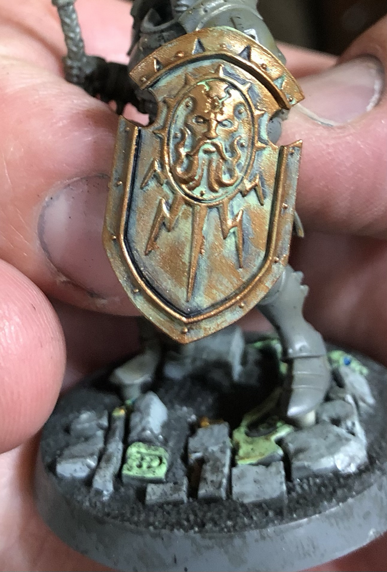 Would nuln oil look good on this shield? Throw it over everything