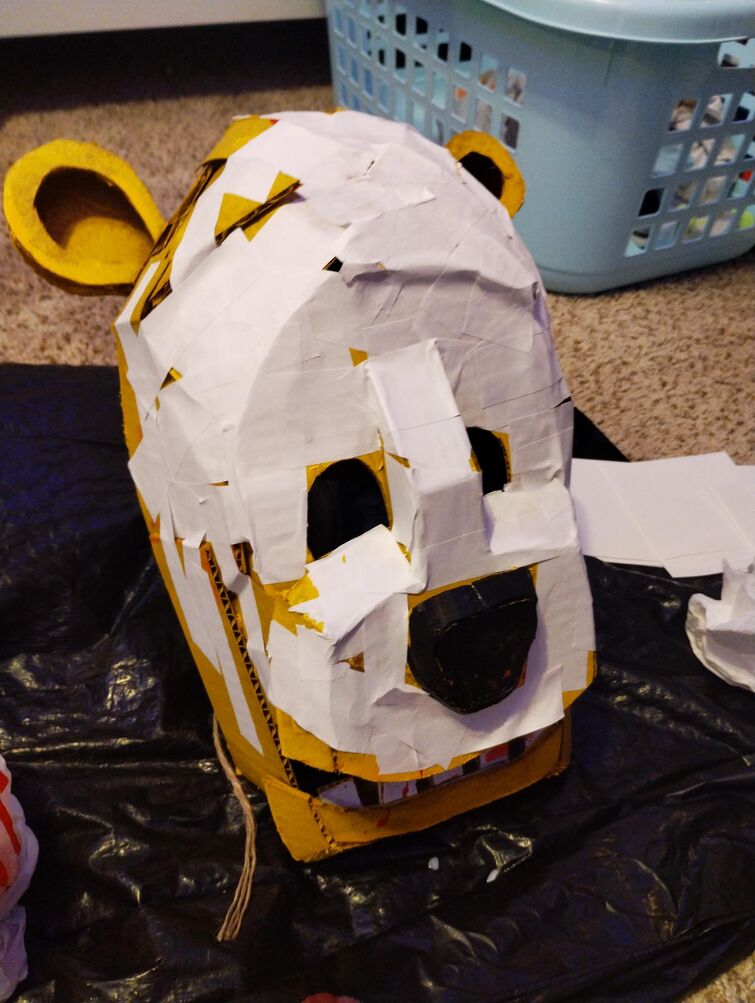 I made a Freddy mask from FNAF: Help Wanted using only cardboard and paper.  (I don't know how to use other materials) I made it possible to make the  eyes open and