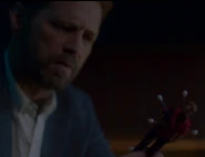 Holding Brandon doll