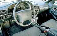 The steering wheel of an Oldsmobile Cutlass Supreme