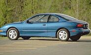 A blue 1995 Pontiac Sunfire coupe