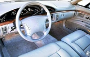 The steering wheel of a 1996 Oldsmobile Ninety-Eight