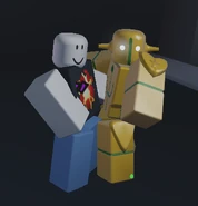 Gold Soft & Wet and its user menacingly posing.