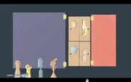 Second rightmost shelf consisting trophies for an egg, cat, mug and lamp.