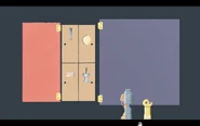 Second leftmost shelf consisting trophies for a clothespin, apple, pie and push-pin.