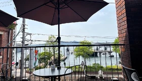 Kure.png (546 KB) The actual café is Minatomachi Coffee, in Kure by the submarine wharf