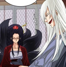 Baek-Son laughing at Hyun-Ryung.