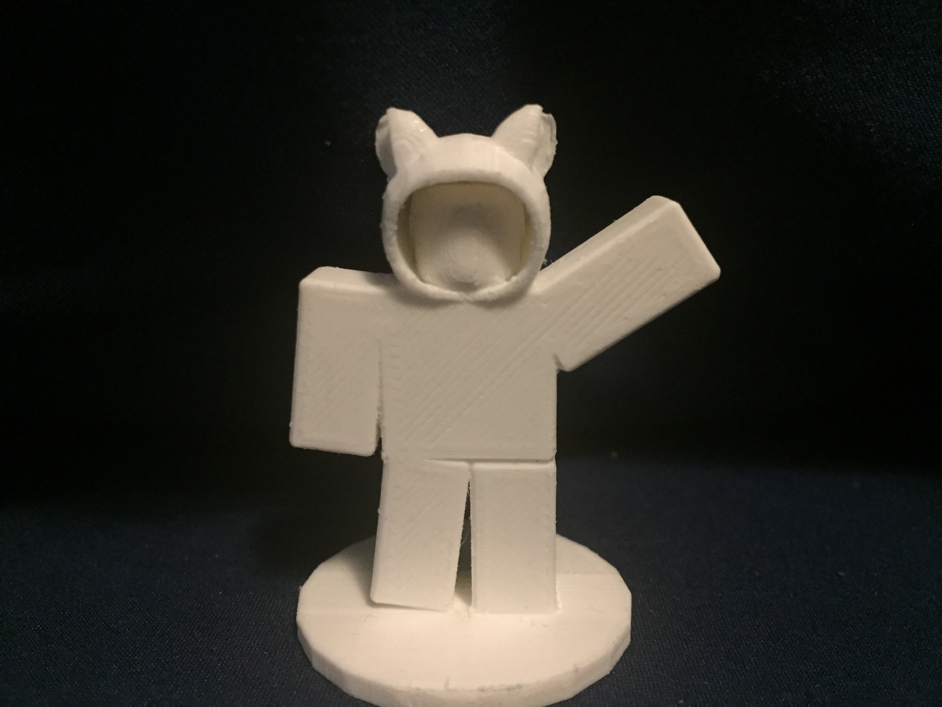 My roblox avatar 3D print. I'm proud of it! My username is neonchameieon.