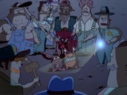 The townspeople discover the monsters, thinking they're aliens.