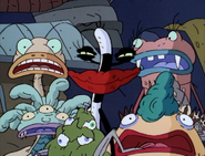 Oblina makes a devious grin as she plans to sit in the Gromble's chair, surprising the girls again.