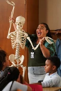 Ashley disrupts Melissa's class with her unconventional way of teaching the class about bones.