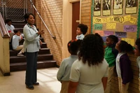 Students falling in line to use the third-floor bathroom.