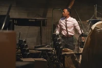 Gregory looking for and finding an ADA desk in the storage room.