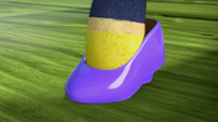 106b - Purple shoe being worn