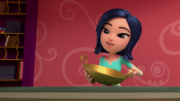 114b - Miranda holding the wok