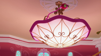 107a - Otis hides on the chandelier