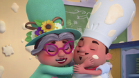 207b - Chef Beth happily hugs her son