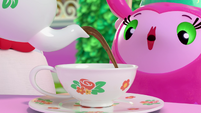 103b - Tea pouring into Princess Flug's cup