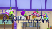 Flower Fuzzlies making music with kitchen stuff