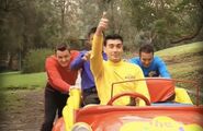 The Wiggles pushing the Big Red Car