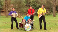 The Wiggles playing their instruments