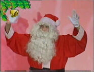 Santa in The Wiggly Big Show (Notice that the GIF Christmas bells and mistletoes are added)