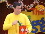 Greg holding a yellow hankie