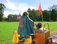 Wally putting his helmet away