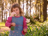 Brooke smelling flowers