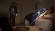 Mingan grieves his father's death.