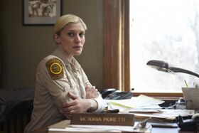 Vic at her desk