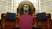 At the witness stand during his own trial