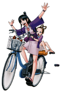 Maya Riding A Bike With Pearl (1)