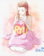 Iris (disguised as Dahlia) knitting a shirt for Phoenix in the outro (Japanese version).