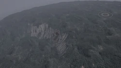 A missile silo facility in ; entrance tunnel in center, one silo at top-right