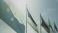 The flags of the countries in the Belkan War flying over Lumen; Osea's in foreground, Yuktobania's in background