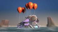 The Nindroid MechDragon being lifted out of the sea.