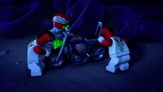 The Fangpyre inject venom into a motorcycle.