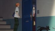 Saku opening the door to leave for school