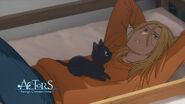 Ryo lying with the black cat
