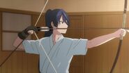 Kaoru pulling his bow string back