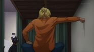 Ryo punching the wall